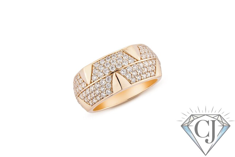 May include: A gold ring with a geometric design. The ring features rows of small, sparkling stones and triangular accents. The ring is set against a white background, highlighting its intricate details and craftsmanship.
