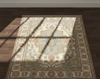 May include: Rectangular area rug with an intricate, symmetrical design. The rug features a cream-colored central field with a large, ornate medallion in shades of blue, green, and peach. A detailed border frames the design, and the rug is placed on a dark wood floor.