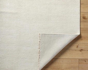 Handgeknoopt crèmewollen vloerkleed: minimalistisch effen gebroken wit tapijt
