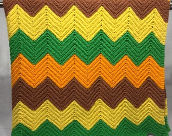 Vintage afghan blanket done in green, yellow, orange, and brown, in a chevron pattern, handmade, zig zag, retro afghan, retro afghan