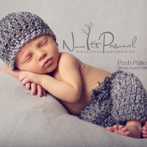 May include: A newborn baby wearing a gray crocheted hat and matching pants. The baby is sleeping on a gray blanket. The image includes the text "Now It's Personal Photography" and "Posh Patterns Modern Crochet & Knitting Designs".