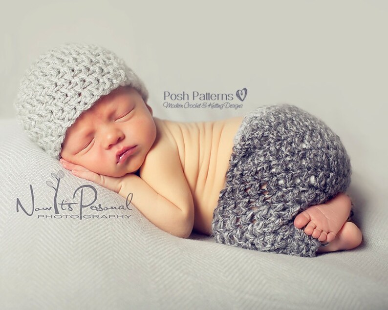 May include: A newborn baby wearing a gray crocheted hat and matching shorts. The baby is sleeping on a white blanket. The image includes the text "Now It's Personal Photography" and "Posh Patterns Modern Crochet & Knitting Designs".