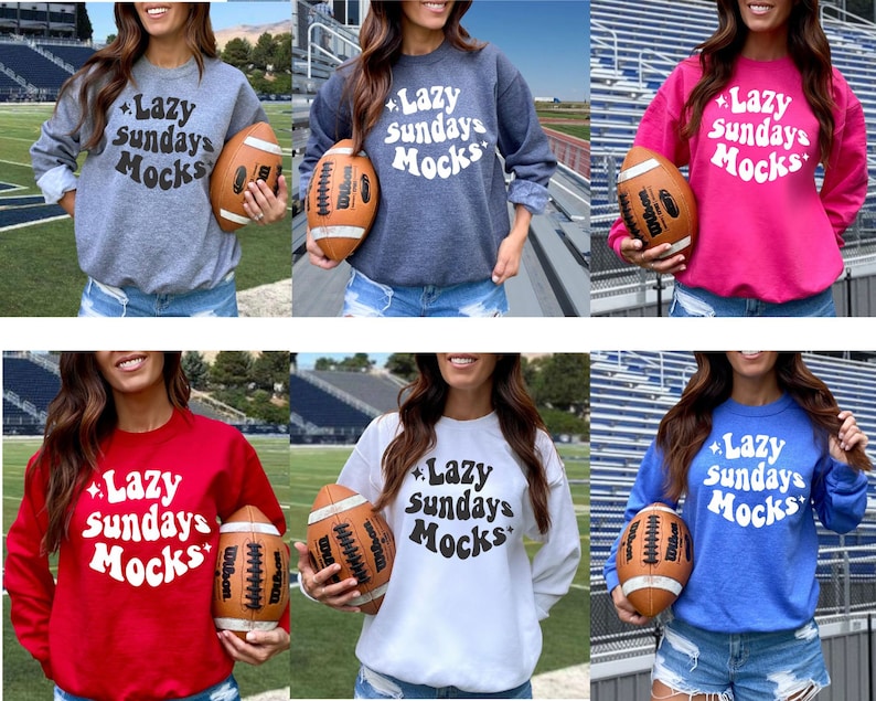 K&ouml;nnte beinhalten: Eine Auswahl an Sweatshirts mit Rundhalsausschnitt in verschiedenen Farben, darunter Grau, Marineblau, Pink, Rot, Wei&szlig; und Blau. Jedes Sweatshirt zeigt den Text "Lazy Sundays Mocks" in einer Retro-Schriftart. Ein brauner Football wird vor jedem Sweatshirt gehalten.