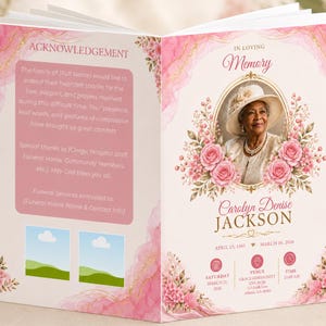 May include: A funeral program booklet featuring a pink watercolor background with gold accents. The cover displays a portrait of Carolyn Denise Jackson in an oval frame surrounded by pink roses, with text for dates, venue, and time, plus an acknowledgement section.