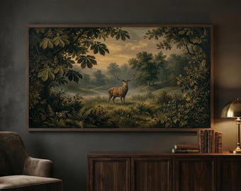 May include: A framed landscape painting depicts a majestic deer in a forest clearing. The artwork features a brown deer with large antlers, surrounded by lush green foliage and trees. The painting has a vintage aesthetic with a warm, inviting color palette.