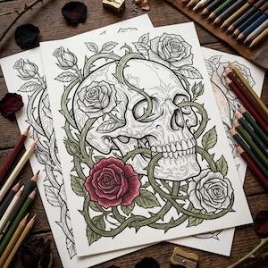 Pode incluir: Duas p&aacute;ginas para colorir com um desenho de caveira entrela&ccedil;ada com rosas e vinhas espinhosas. Uma rosa &eacute; colorida de vermelho. L&aacute;pis de cor e um apontador s&atilde;o vis&iacute;veis em uma superf&iacute;cie de madeira.