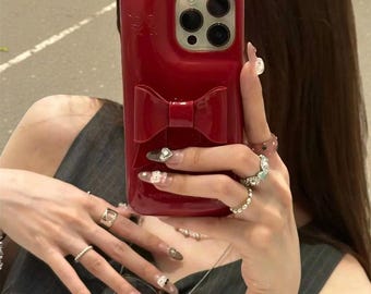 Funda brillante con lazo 3D para iPhone 12, 13, 14, 15, 16 y 17, de cuero suave y resistente a los golpes