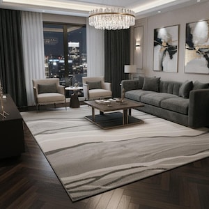 May include: A modern living room featuring a large gray area rug with a wave pattern in shades of gray and white. The room includes a gray sofa, two armchairs, a coffee table, and abstract artwork. A large window offers a city view.
