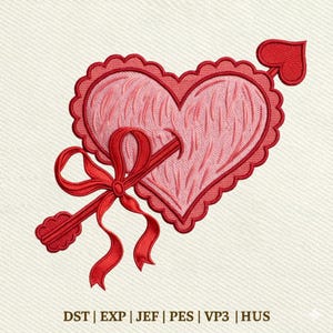 May include: Embroidered design of a pink heart pierced by a red arrow with a heart-shaped arrowhead. The heart has a scalloped border and is adorned with a red bow. The design is on a cream-colored background.