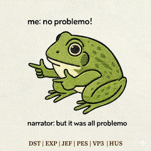 Puede incluir: Diseño bordado de una rana verde con ojos grandes, señalando con el dedo. El texto "me: no problemo!" está encima de la rana, y "narrator: but it was all problemo" está debajo. El diseño está sobre un fondo blanco roto texturizado.