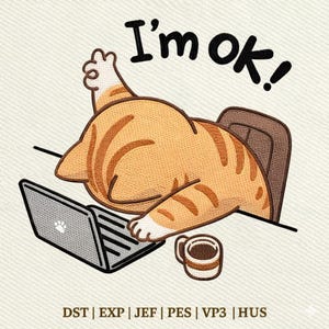 May include: Embroidered design of a ginger cat lying on a desk with a laptop and a coffee mug. The cat is in a chair and the text "I'm ok!" is above the cat. The design is on a light beige background.