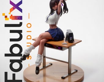 May include: A female anime-style figurine with dark skin and long dark hair tied in a ponytail, wearing a white short-sleeved shirt, a dark blue pleated skirt, and white leg warmers with black shoes, sitting on a wooden desk with a black bag.