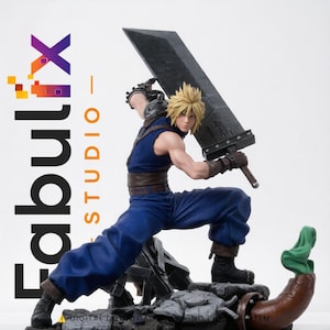 May include: A detailed figurine of a spiky-haired character in a blue sleeveless top and pants, wielding a large dark gray sword. The character stands on a rubble-filled base with a brown pipe. Text on the left reads Fabulix STUDIO.