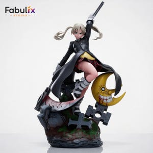 Three quarter angle render of Maka Albarn collectible resin statue featuring oversized scythe weapon, school uniform, moon themed display, and premium anime presentation.