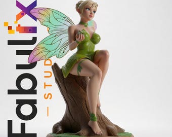 May include: A figurine of a fairy with blonde hair, pointed ears, and iridescent rainbow wings, wearing a green leaf-patterned dress and sitting on a brown tree stump. The text Fabulix Studio and Digital Download Only No Physical Item appear.