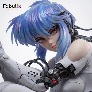 Close up view of Motoko Kusanagi anime resin figure featuring detailed facial expression, futuristic body suit, and high-resolution cyberpunk sculpt.