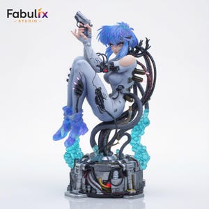 Base version of Motoko Kusanagi 3D print model featuring intricate technology elements, weapon accessory, and collectible display quality.