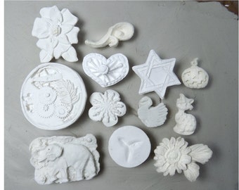 ceramic stamps - texture stamps -soap stamp -pottery stamps -  One time grab bag of  ( 12 )  bisque stamps -  ( 285 )