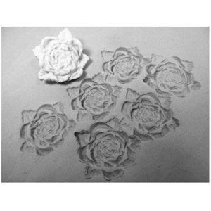 clay stamps -pottery tools -metal stamps -soap stamps -bisque stamps -ceramic stamps - -Rose stamp - - #  259