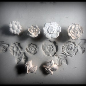 Hand caved Stamps, Pottery Supplies, Clay Stamps ( 4 ) flower.(2) leaf patterned bisque stamps ( 171 )