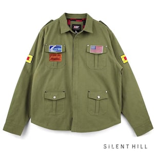 May include: Olive green jacket with multiple pockets, patches, and an American flag. The jacket has a collared neckline and long sleeves. The text "SILENT HILL" is at the bottom of the image.