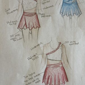 May include: A sketch of a figure skating dress design. The design features a red skirt with a layered mesh, nude mesh sleeves, and gold rhinestone accents. The top is off-white with red mesh frills.