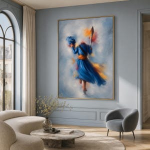 Pode incluir: Uma pintura a óleo vertical numa moldura dourada retratando uma figura com um manto azul fluido e uma faixa laranja, segurando um turbante azul e uma lança. O fundo apresenta pinceladas abstratas em azul, branco e laranja com efeito dinâmico.