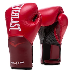 May include: Pair of red Everlast Elite boxing gloves. The gloves have a red and burgundy colour scheme with the Everlast logo in white. The gloves have a mesh palm for breathability and a hook-and-loop wrist strap.