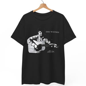 May include: A rustic wooden sign with the text "Welcome to our home" in a handwritten style. The sign features a distressed finish and a simple, inviting design, perfect for a front porch or entryway.