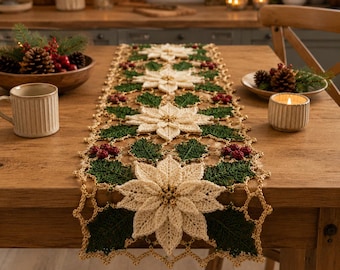 May include: A crochet table runner featuring a repeating pattern of cream-colored poinsettia flowers, dark green holly leaves, and small red berries. The runner has a scalloped gold-toned border and is centered on a wooden dining table.