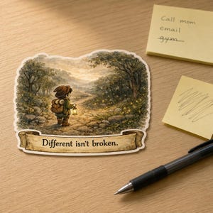 Könnte beinhalten: Ein Aufkleber mit einer Illustration einer Figur mit Rucksack und Laterne, die auf einem Waldweg geht. Der Aufkleber hat ein Banner mit dem Text "Different isn't broken."