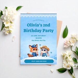 May include: A light blue birthday party invitation with the text "Olivia's 2nd Birthday Party". The invitation features cartoon fox and bunny characters. The RSVP phone number is (888)-888-8888.