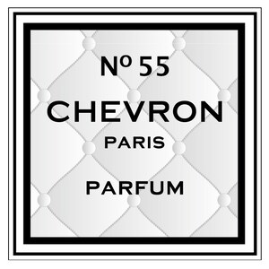 May include: A white and black label with the text "No 55 CHEVRON PARIS PARFUM" on a quilted background.