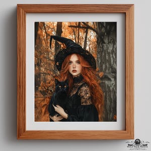 May include: Framed print of a red-haired witch in a black dress and hat, holding a black cat with yellow eyes. The background depicts an autumn forest with orange and brown leaves. The print is in a wooden frame.