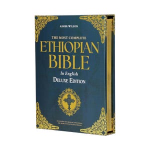 May include: A deluxe edition of "The Most Complete Ethiopian Bible" in English. The book has a dark blue cover with gold lettering and decorative accents. The title and author's name are prominently displayed.
