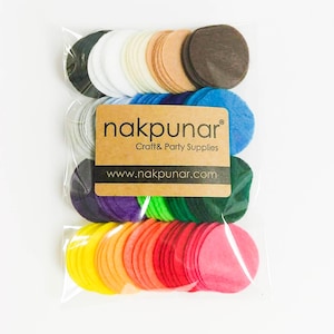 May include: A bag of colorful felt circles, perfect for crafting or party decorations. The bag includes a variety of colors, including red, orange, yellow, green, blue, purple, and brown. The bag also includes a label with the company name "nakpunar" and the website address "www.nakpunar.com".