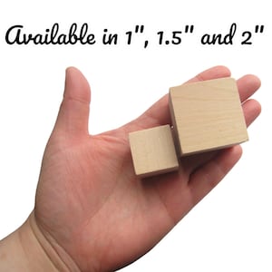 May include: Three wooden blocks in different sizes, 1 inch, 1.5 inches, and 2 inches. The blocks are made of natural wood and have a smooth, unfinished surface.