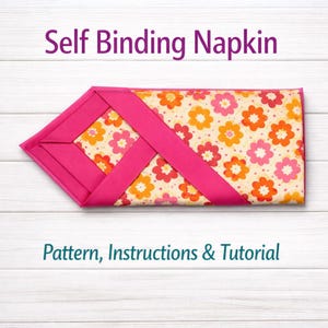 May include: A self-binding napkin with a floral pattern in orange, pink, and yellow. The napkin is accented with a bright pink border and crisscross design. The text "Self Binding Napkin" and "Pattern, Instructions & Tutorial" are displayed.