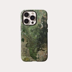 May include: A smartphone case featuring a dark green collage design with illustrations of frogs, butterflies, crescent moons, stars, and vintage script text. The case has a black camera cutout area with three circular lenses visible on the back.