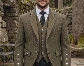 May include: A three-piece olive green tweed suit featuring a blazer, a matching waistcoat with silver buttons, and a white collared shirt with a dark plaid tie. A dark green and red plaid kilt is worn with a black leather sporran with tassels.