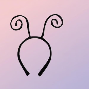 May include: A black headband with two curved antennae-like spirals on top. The headband is a simple, solid design, perfect for costumes or everyday wear. The background is a gradient of pink and purple.