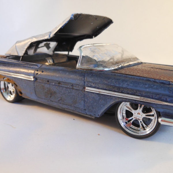 1959 Chevrolet Impala 1/24 scale model car in blue