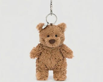 Llavero de peluche con forma de oso Bartholomew de Jellycat para bolsos y accesorios.