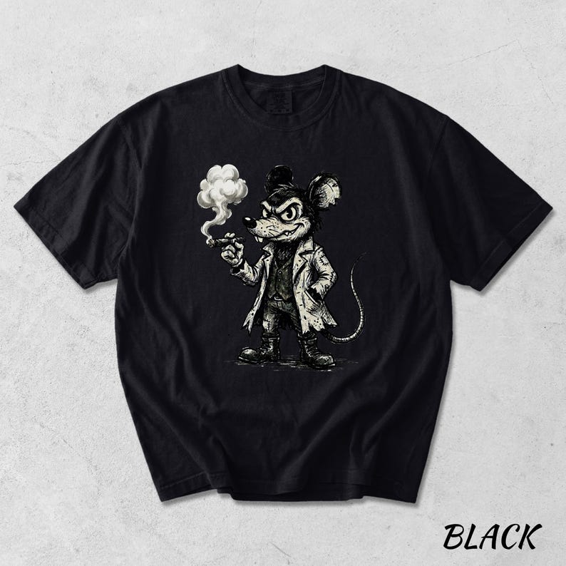May include: Black t-shirt featuring a cartoon mouse character in a trench coat, smoking a cigar. The mouse has a stern expression and is drawn in a vintage, illustrative style. The word "BLACK" is printed in white at the bottom right.