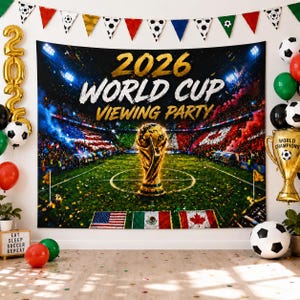 May include: A rectangular wall tapestry featuring a stadium scene with a gold trophy in the center, the text 2026 WORLD CUP VIEWING PARTY, and the flags of the USA, Mexico, and Canada. The scene is decorated with colorful balloons and bunting.
