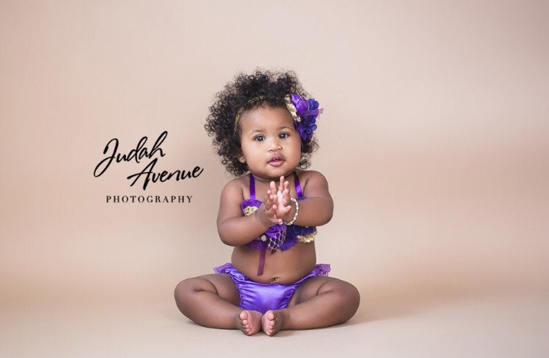 purple black and gold outfit