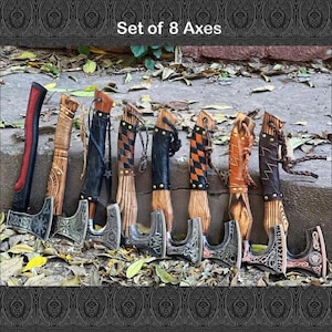 May include: A set of eight axes with wooden handles and engraved metal axe heads. The handles are wrapped in leather and other materials in various colors, including black, brown, and orange. The text "Set of 8 Axes" is at the top.