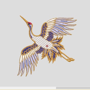 May include: An embroidered design of a crane in flight, featuring intricate details. The bird has white, blue, and gold-colored feathers, with a red accent on its head. The design is set against a light gray background, showcasing the crane's elegant form.