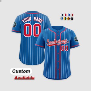 May include: Two blue baseball jerseys with white pinstripes and red detailing. One jersey features "YOUR NAME" and the number "00" on the back. The other has "Souletouyi" and the number "00" on the front. The text "Custom Available" is also visible.