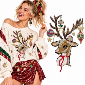 May include: A cream-coloured knit jumper featuring a sequined reindeer head with antlers decorated with hanging ornaments, stars, and a red ribbon. The sleeves have red and green sequined stripes and gold snowflake accents, paired with a red sequined skirt.